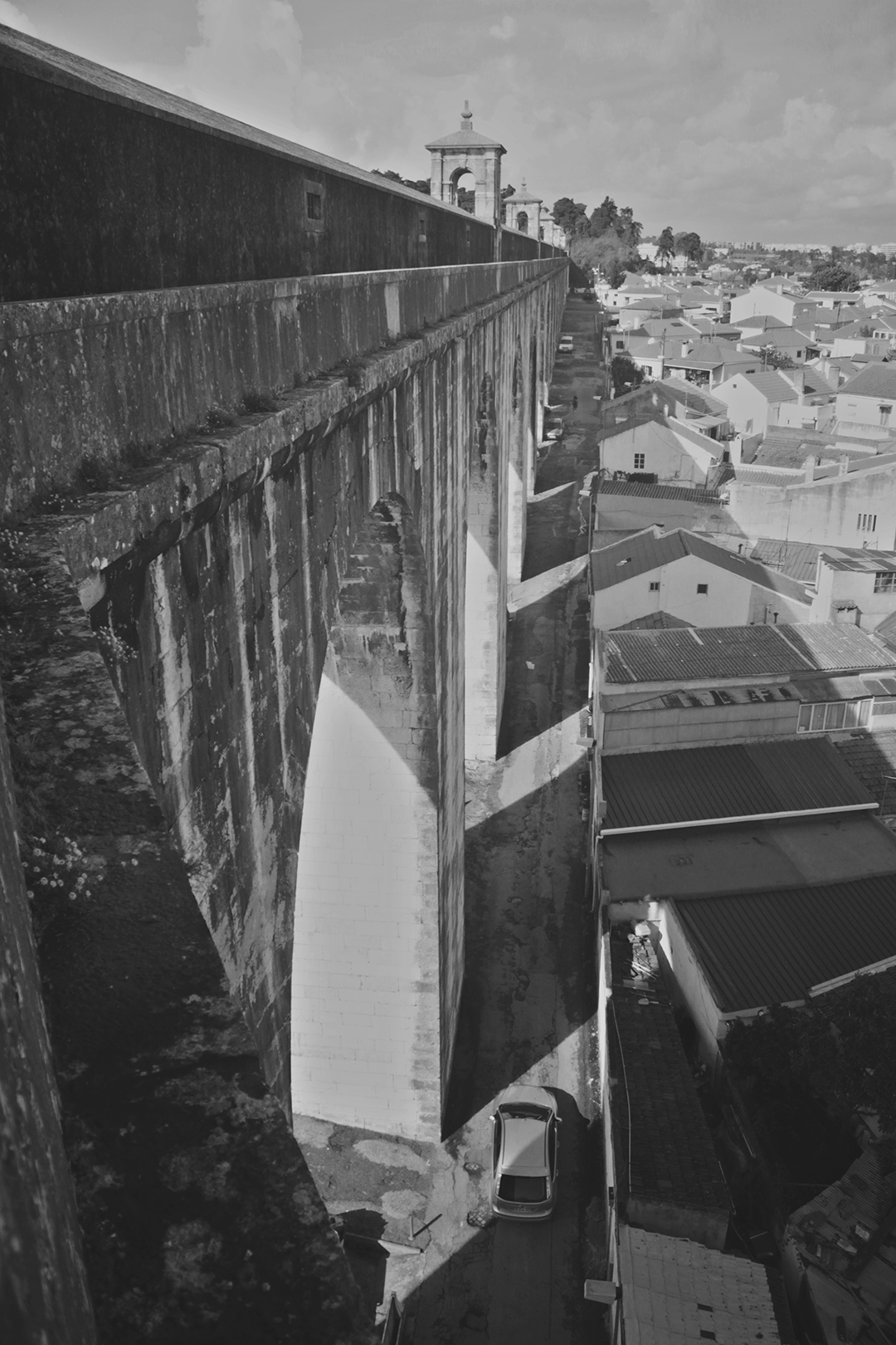 On the trail of Diogo Alves: the aqueduct where he committed his crimes, with the treetops of Monsanto Forest Park in the background.